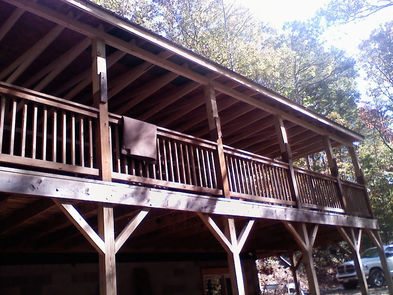 Timber framing under a new elevated porch and deck — Roof Leak Repair in Molino by Roofing Brothers